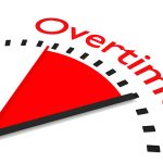 What If You Get Overtime Or A Bonus In An IVA clock with red seconds hand and shaded overtime showcasing overtime or bonis in an IVA