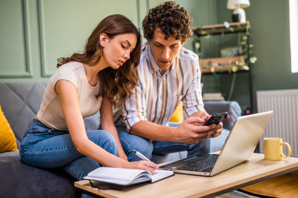 Couple discussing home finance to showcase how your partner is affected by your IVA.