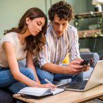 Couple discussing home finance to showcase how your partner is affected by your IVA.